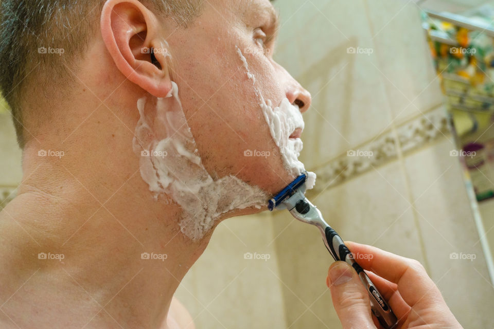 shaving man