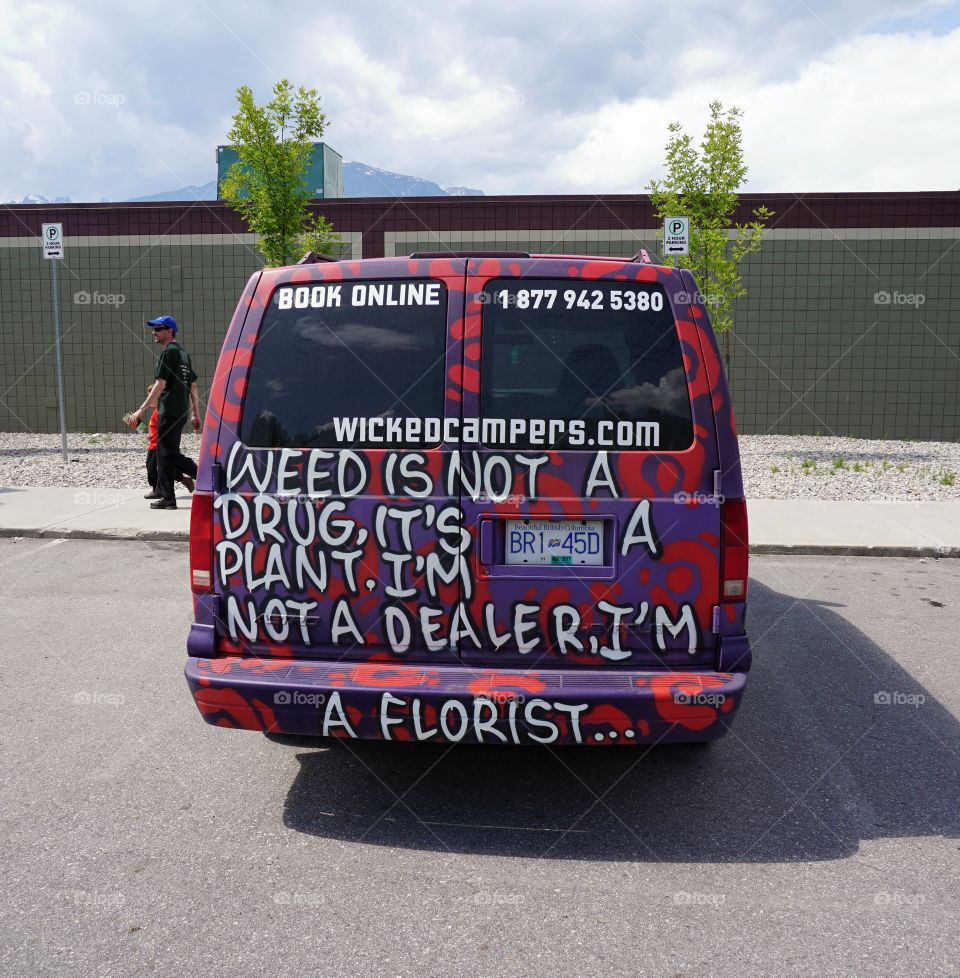 Funny words on the back of a van ... Weed is not a drug .. it’s a plant....I’m not a dealer ... I’m a florist 