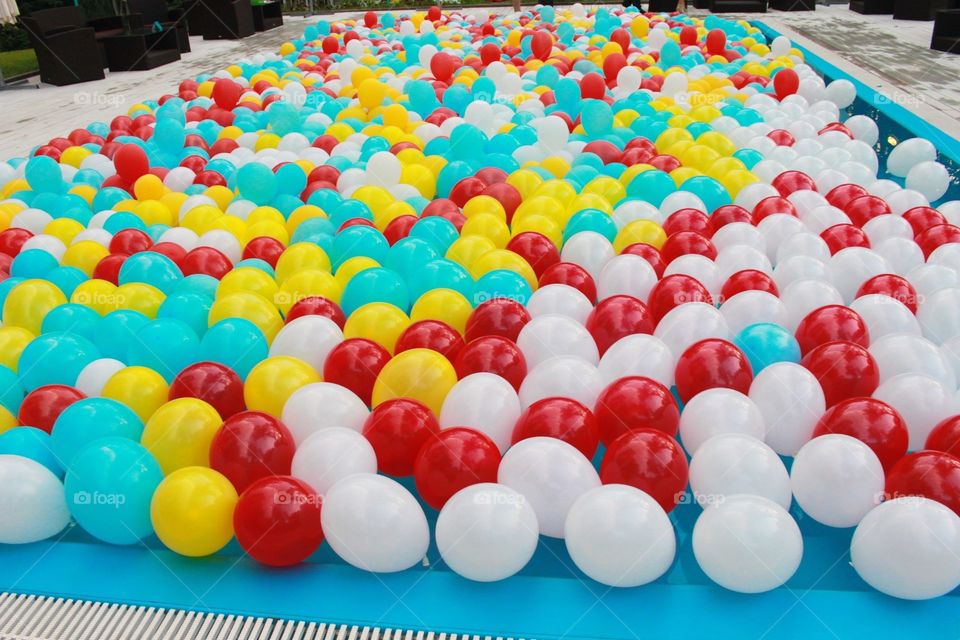 Colorful ballons in swimming pool. Colorful balloons in swimming pool on birthday party