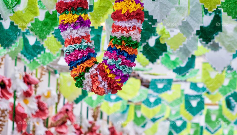 Street colourfully decorated for Festas Dos Tabuleiros in Portugal
