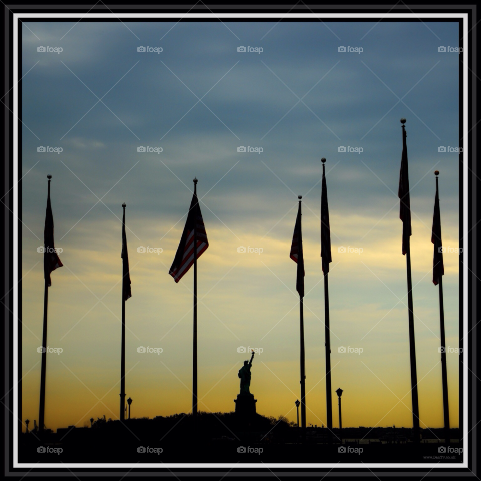 liberty state park sunset usa flags by dantvusa