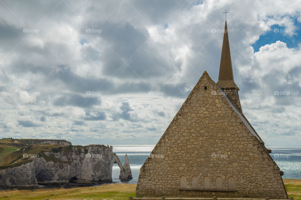 Fishermen's Chapel in France on a beautiful rocky shore in Etretat