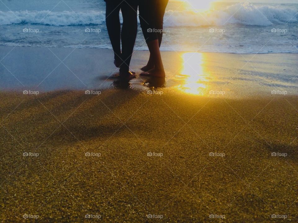 Walking on the beach in summer is soothing