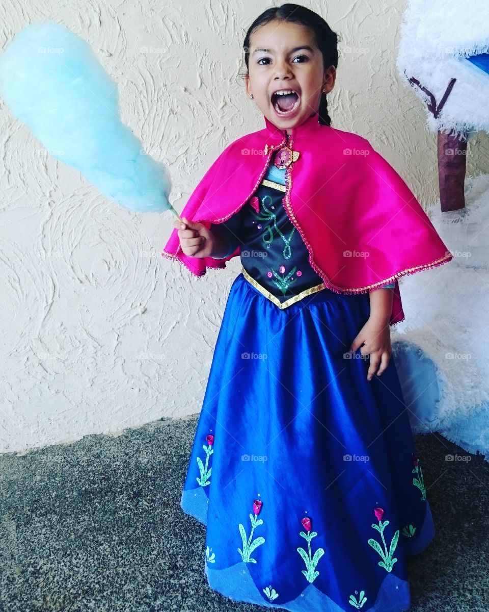Frozen birthday party. Little girl dressed in Ana's custome.