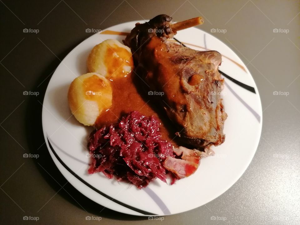 rabbit fry with dumplings and red cabbage