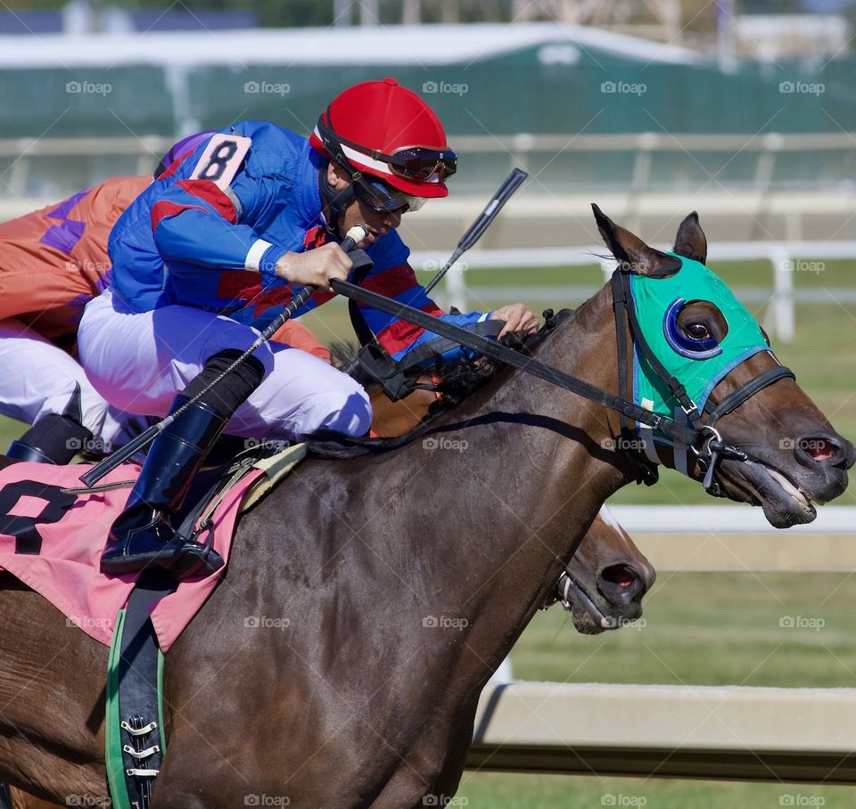 Inoel Beato and Trace of Grace winning the Plum Pretty stakes.