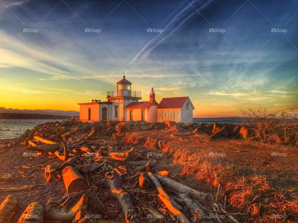 Lighthouse at sunset 
