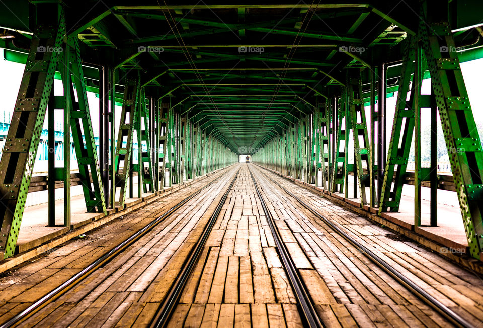 The original two-level bridge in Warsaw was built in Warsaw 1957-59. At its bottom there are tram tracks, pavements and a bicycle path. Poland