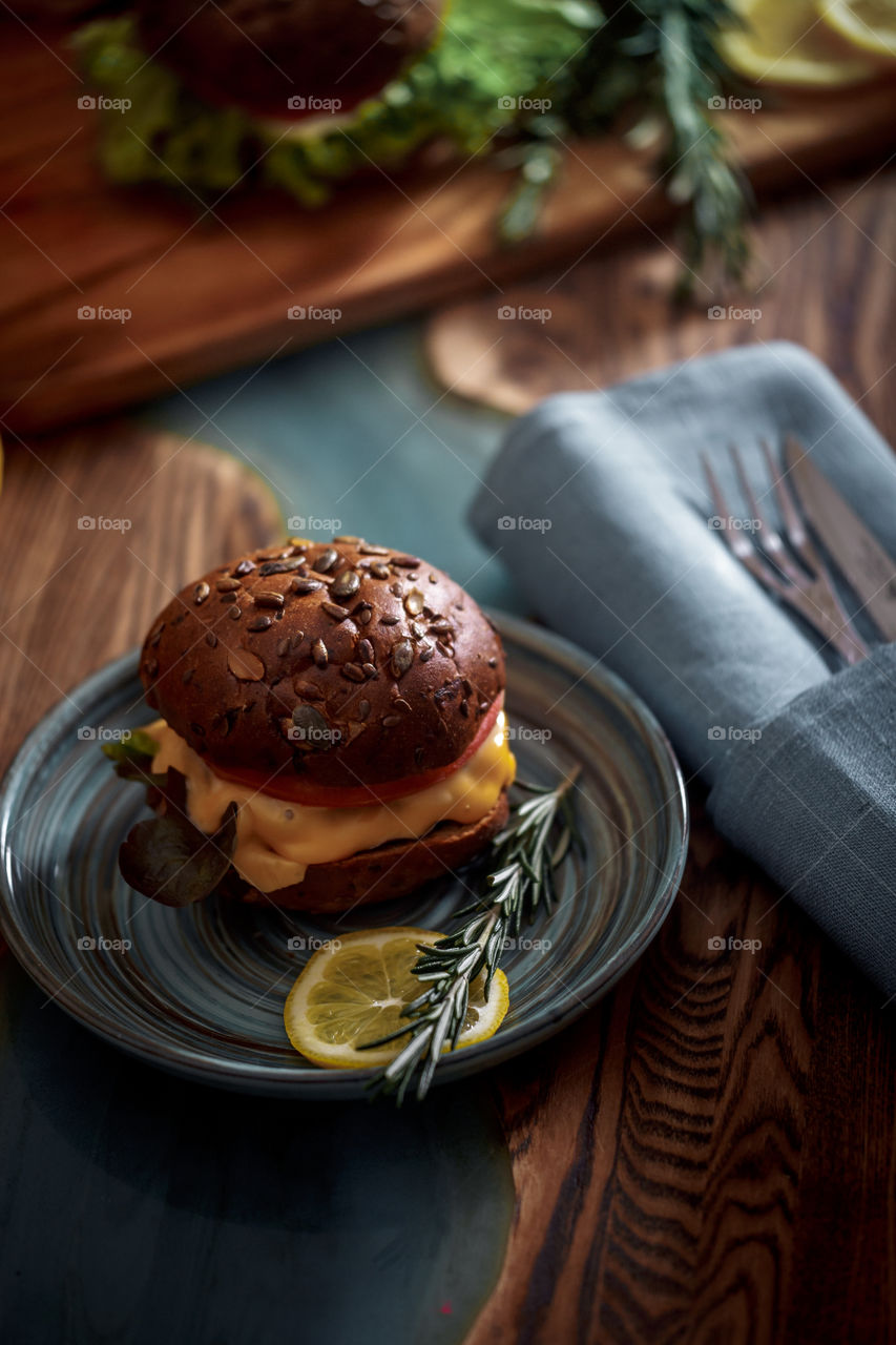 Dark burger with grain bread