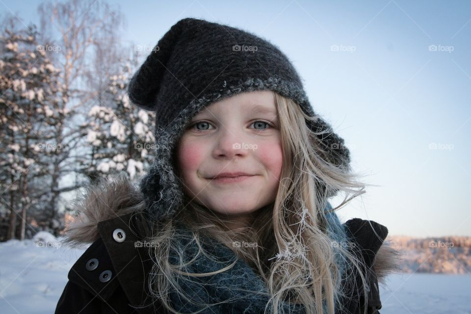 Portrait of smiling girl in winter