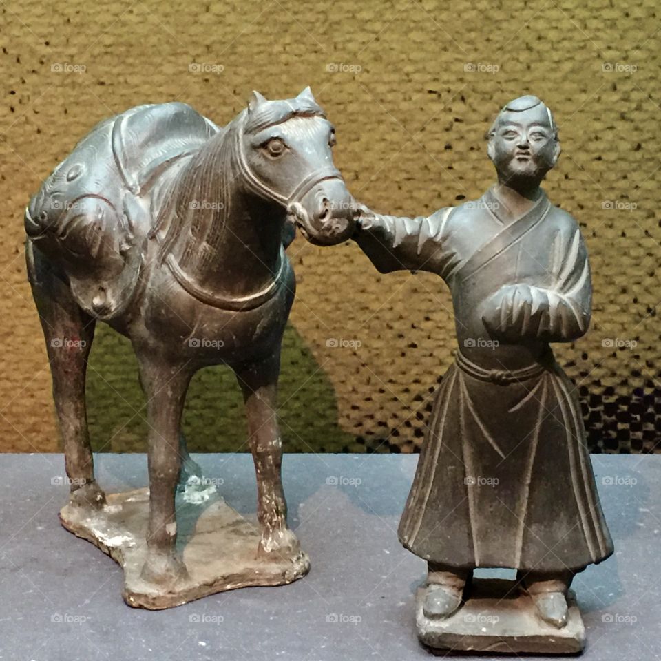 Chinese man with his horse