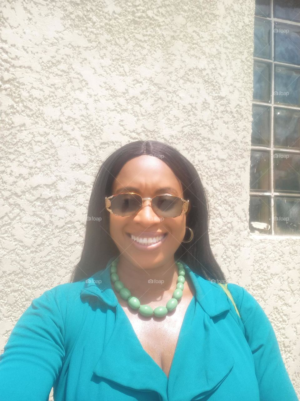 Lady out on a bright sunny day. Energetic, vibrant , light hearted. Love life, live life