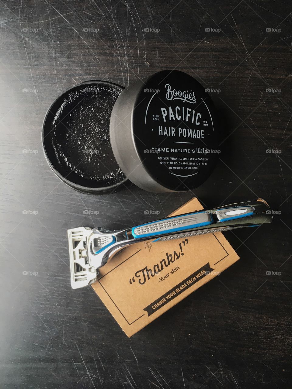 Pacific Hair Pomade. Hair products, and razor.