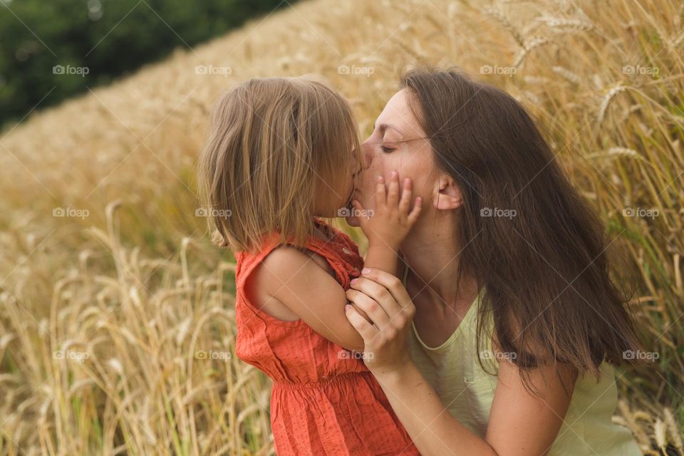 Tenderness photo, tenderness moment, mom and daughter 