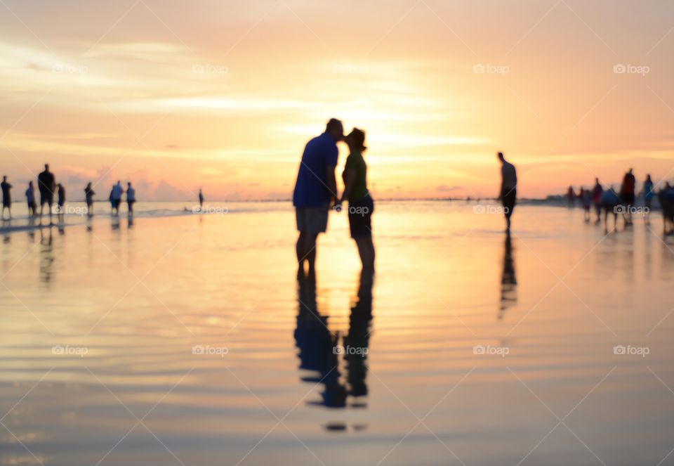 Kiss your partner at sunset 