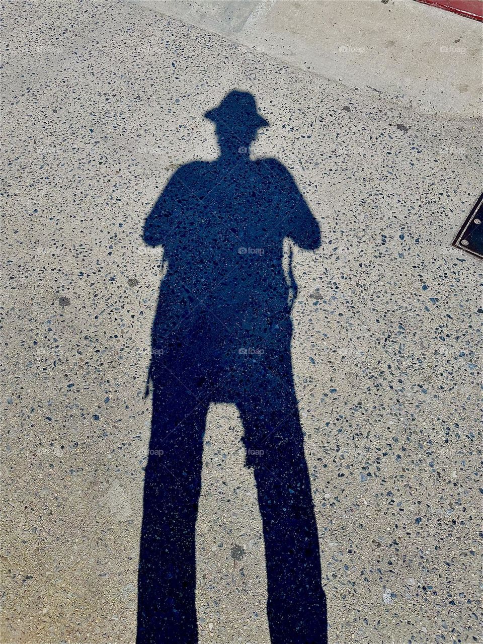 The shadows cast on the pavement of the pedestrian lane of the “Pulaski Bridge” at “Newtown Creek” that connects “Greenpoint”, Brooklyn to LIC, Queens can be quite dramatic and theatrical. 2024. Hypnotic Productions