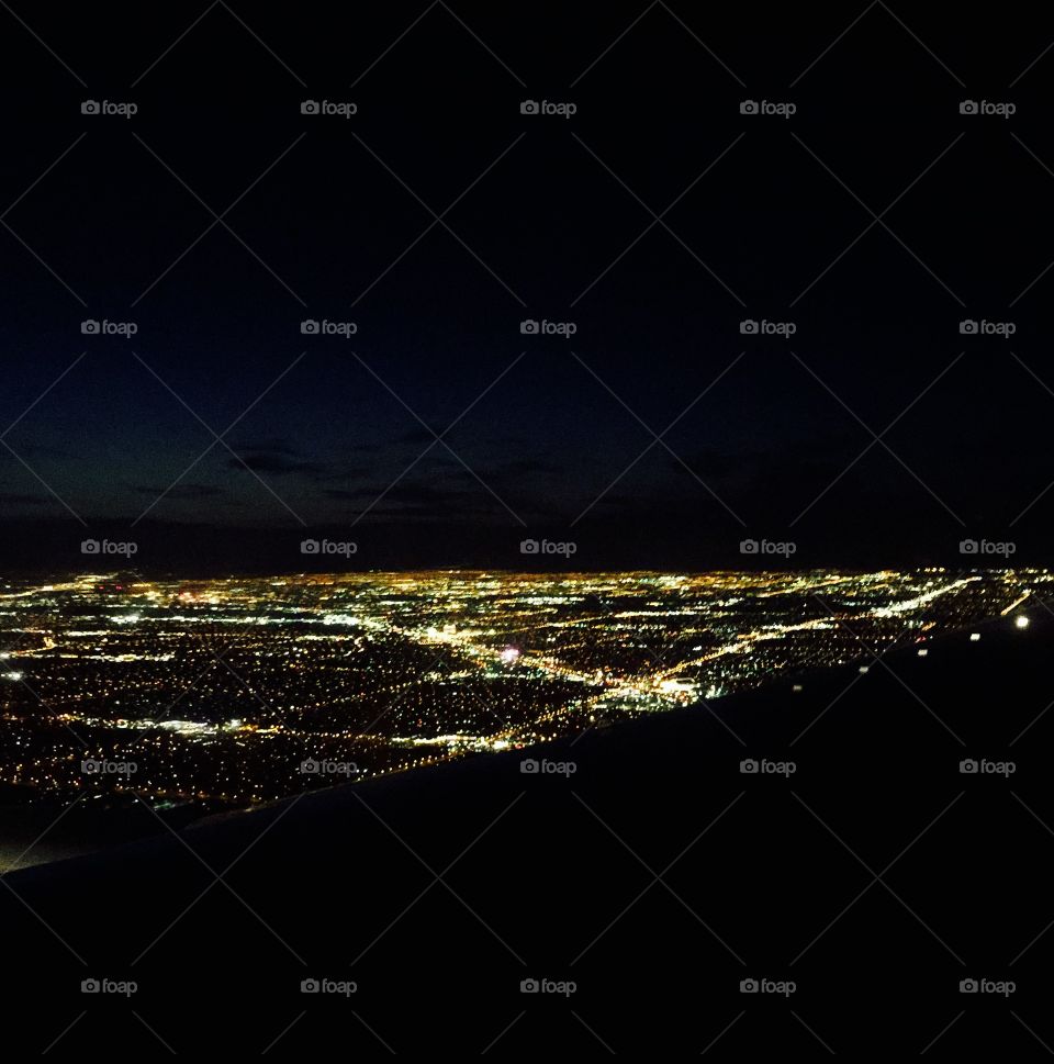 The Las Vegas strip viewed from a plane window at night