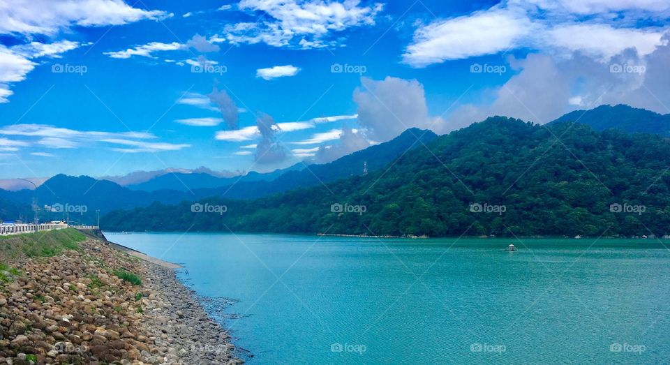 Shihmen Dam is a major rock fill dam across the Dahan River in northern Taoyuan City. It forms the Shihmen Reservoir (石門水庫), Longtan, Taiwan
