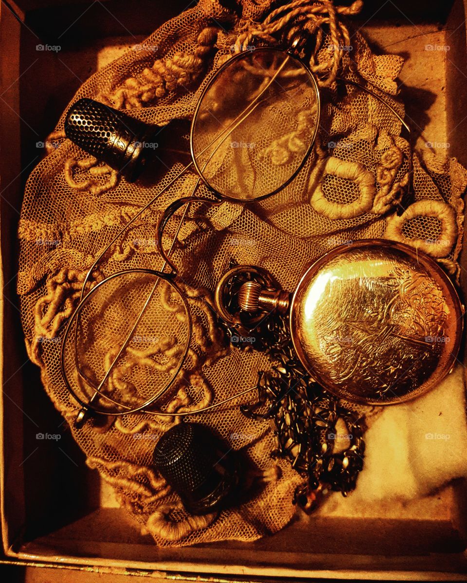 Vintage treasures..pocket watch, thimble and glasses