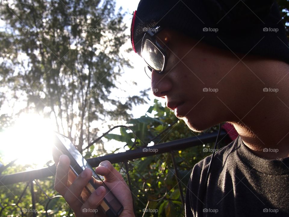 teen using a smartphone