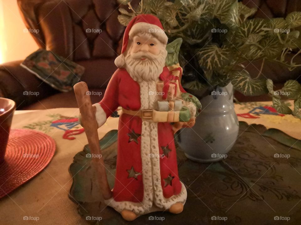 Red Santa decoration in a family home.