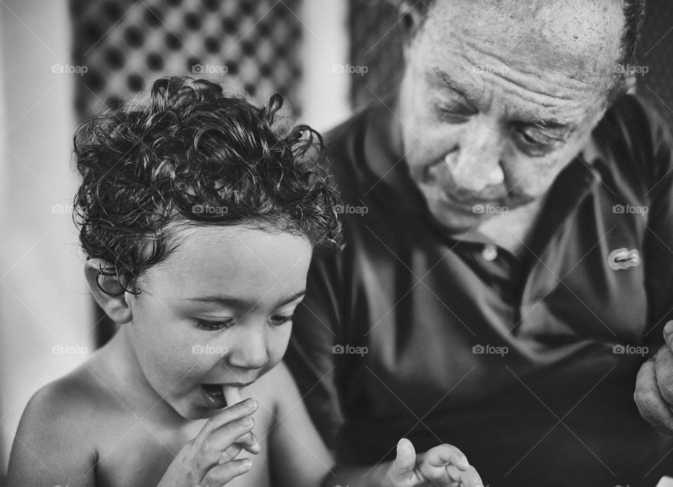 Grandchild and grandpa cute family moment