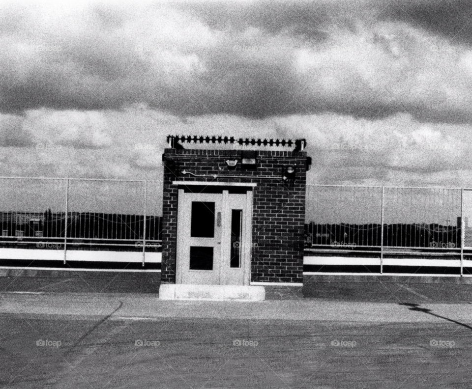 fence clouds blacknwhite hand print exit door by divine