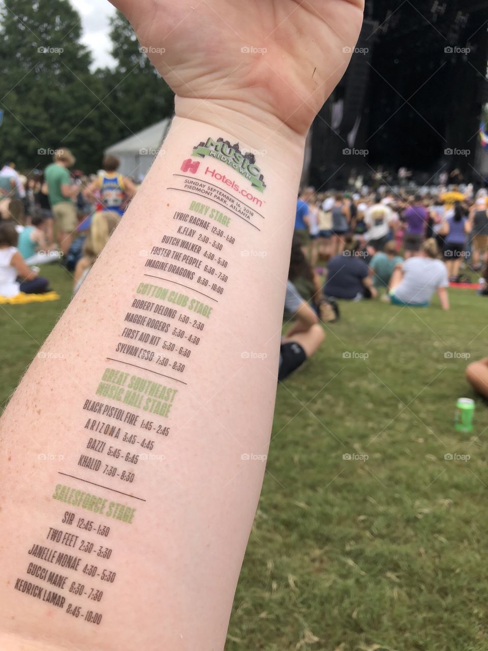 This photo was taken at Music Midtown located in Atlanta, Georgia. I managed to get a fake tattoo of the lineup that was scheduled for that day. 
