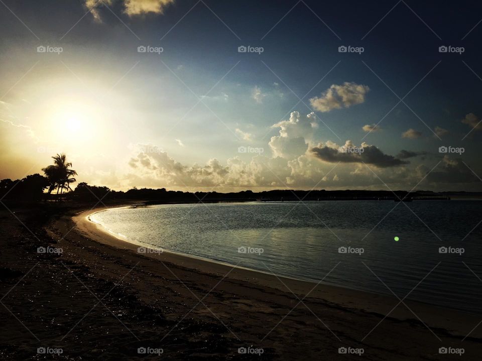 Sunrise on the island, peaceful sunrise, first colors of the morning, quiet morning on the beach, sunrise on St. Martin, before the sun is up