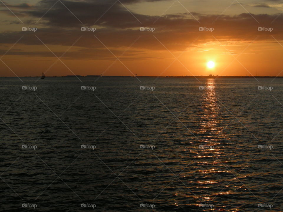 Sunset glints off of the wind-stirred Gulf of Mexico near Destin, Fla.