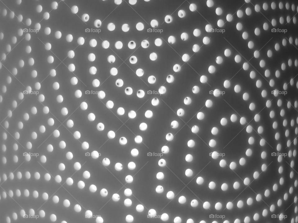 Illuminated pattern surface with various small curve design light passage way