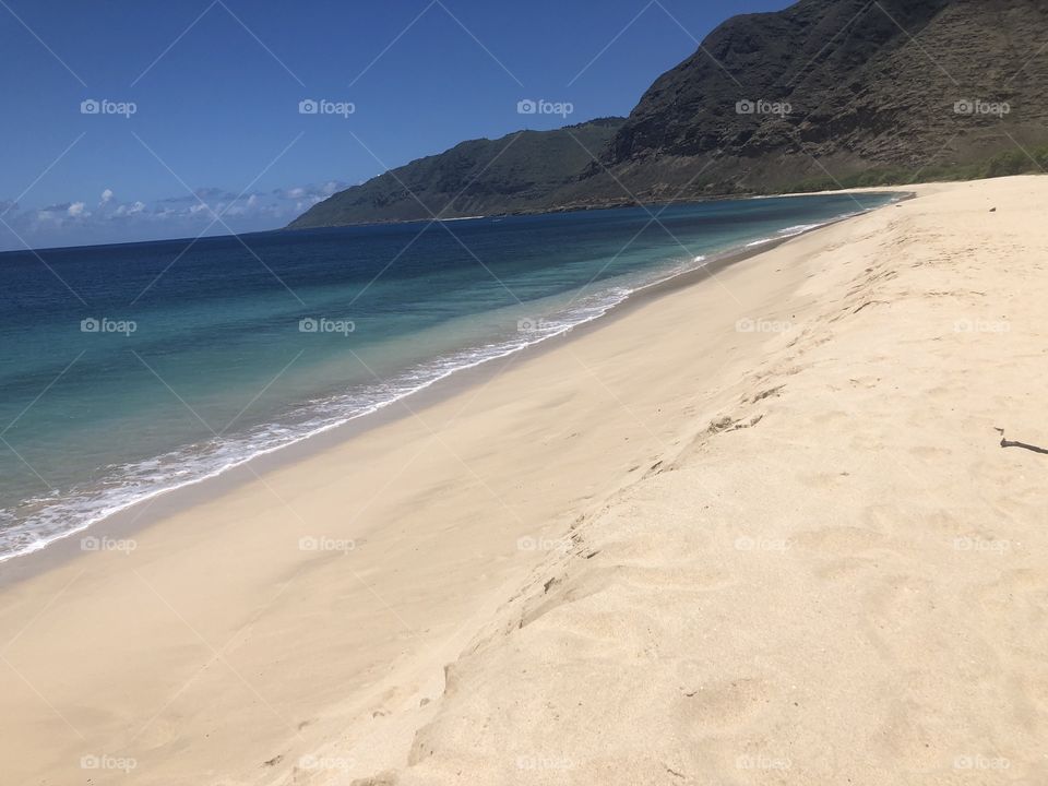 Awesome beach stretched across the north shore!!! Wonderful mountains and desolate waste side 