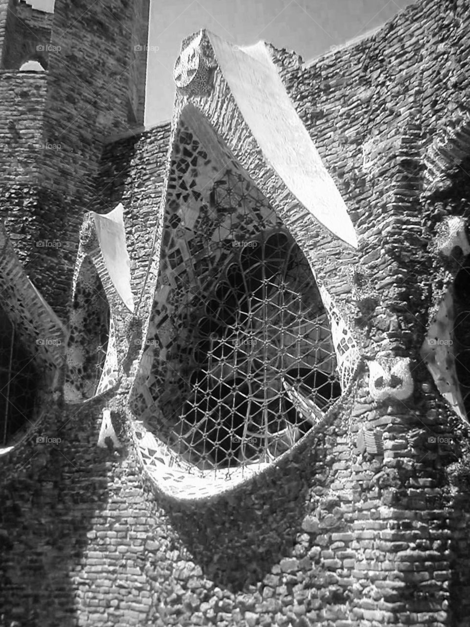 Gaudi window . Guell Colony Crypt Spain 