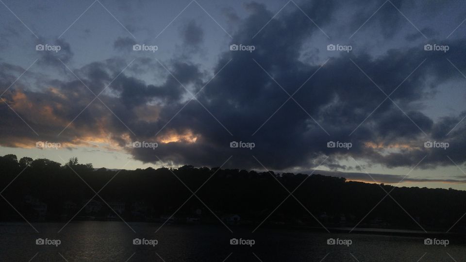 View of storm clouds during sunset