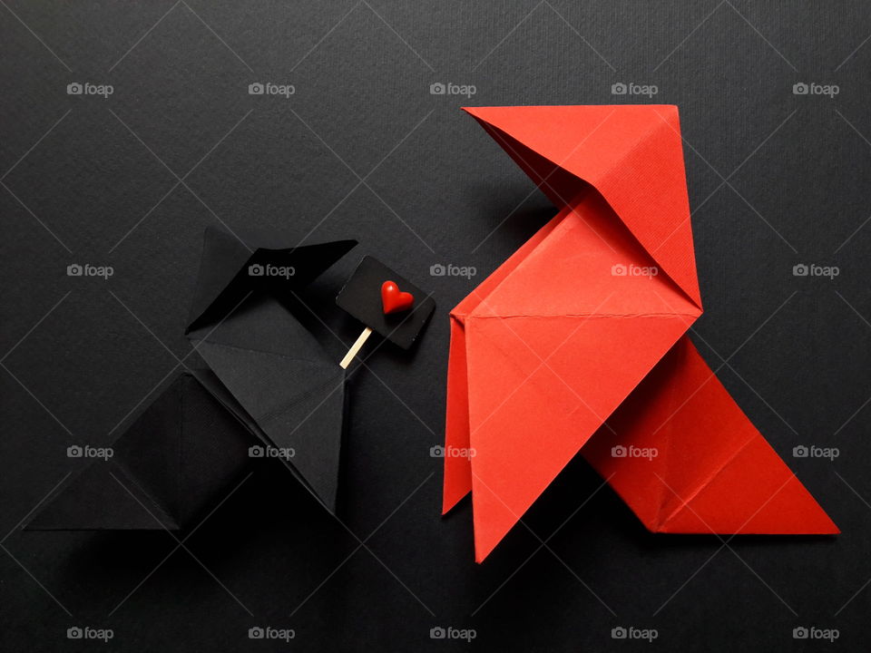 Origami on black background