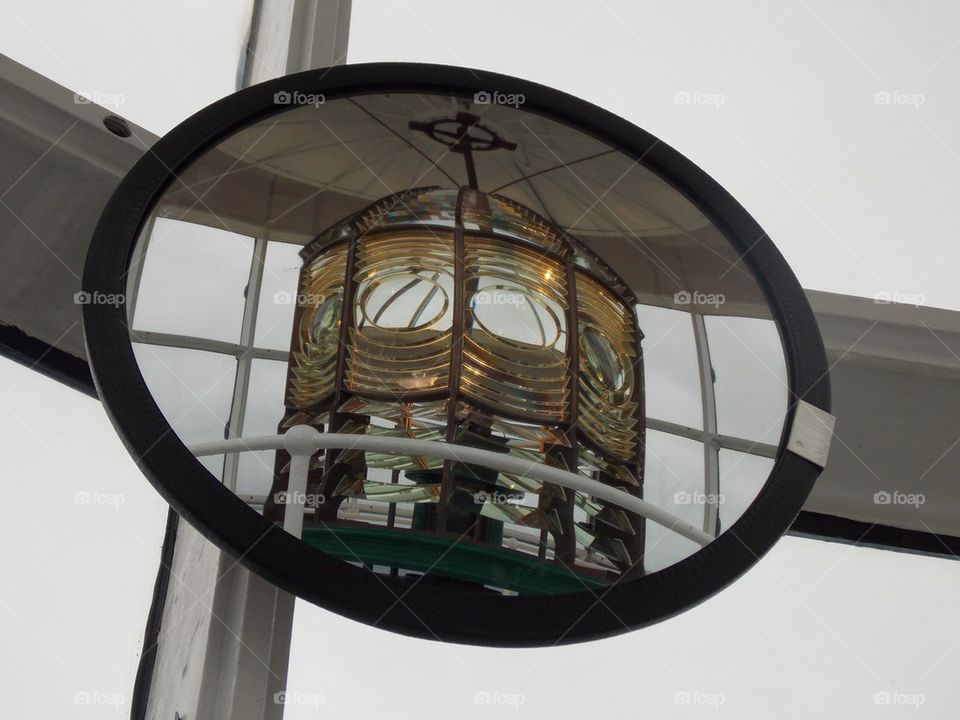 Mirror lighthouse . Reflection inside the ponce inlet lighthouse 