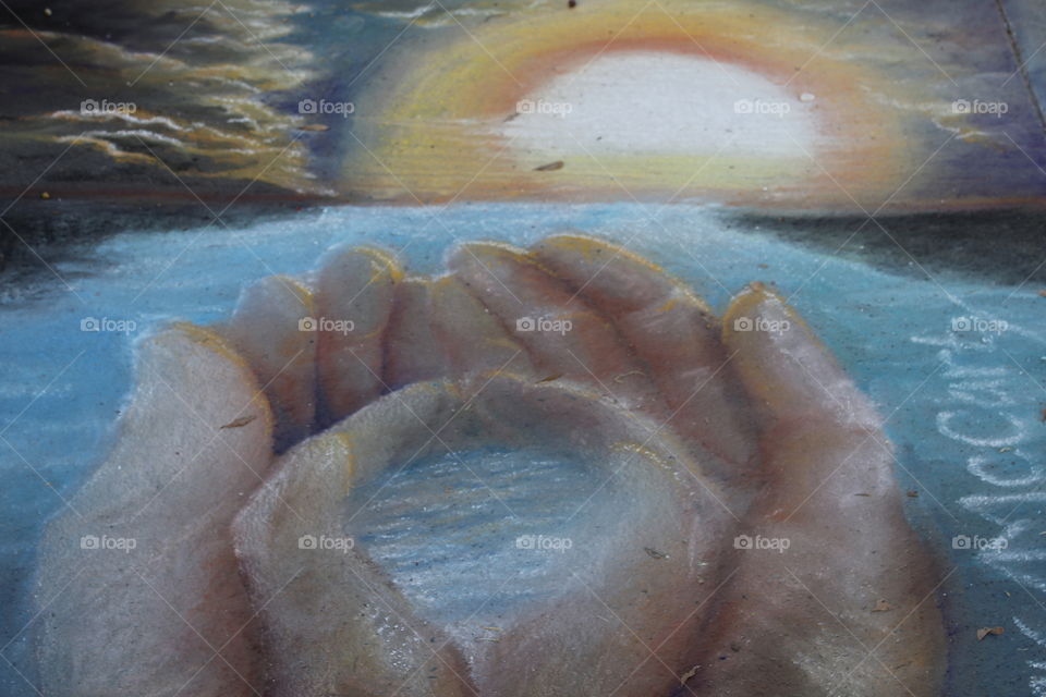 hands holding hands chalk art