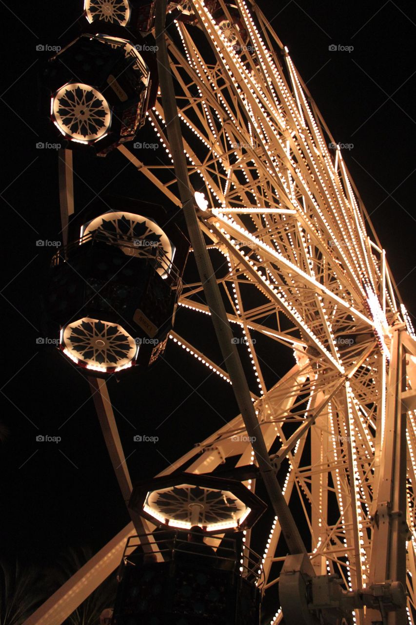 View of ferris wheel at night