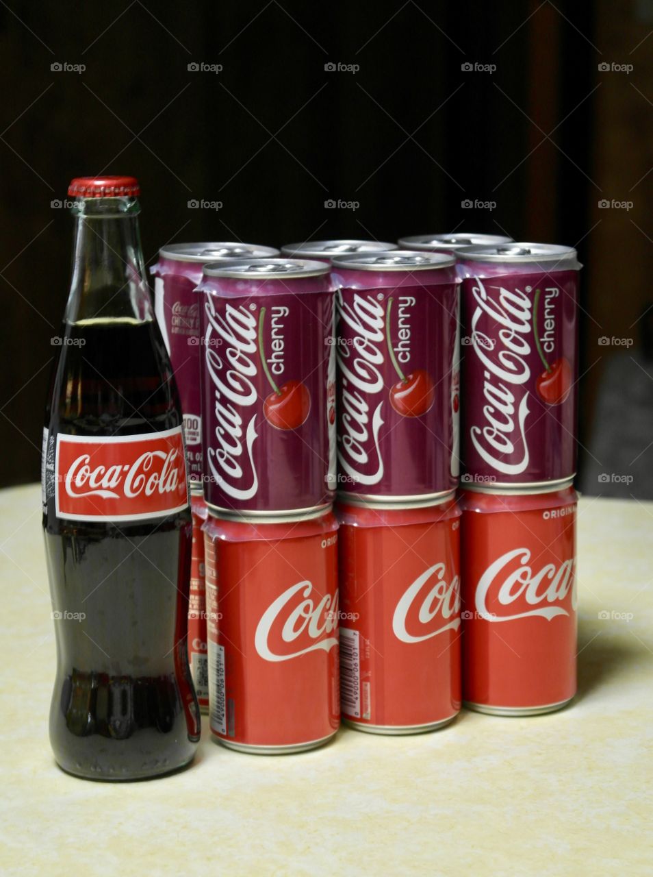 Coca Cola and cherry coke cans and bottle 