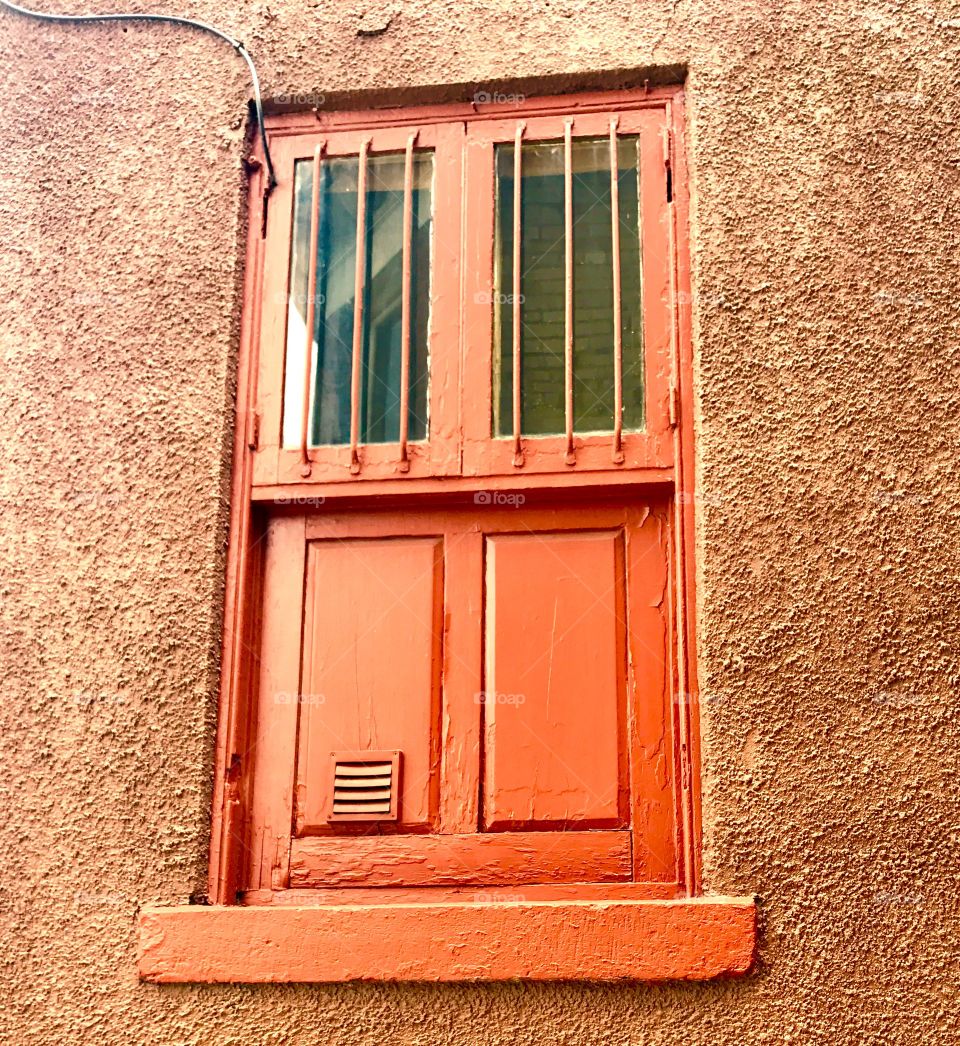 Orange window covering