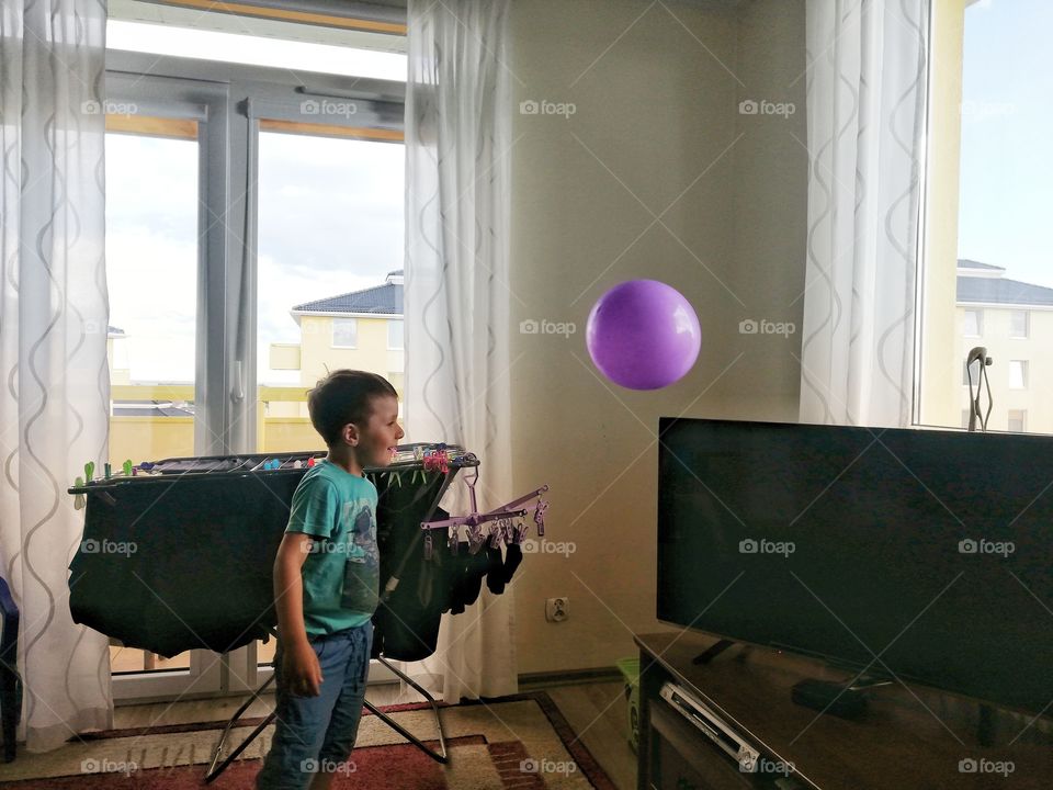 Boy play ballon