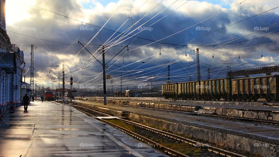 railway railway after the rain. the wires stretch to infinity.