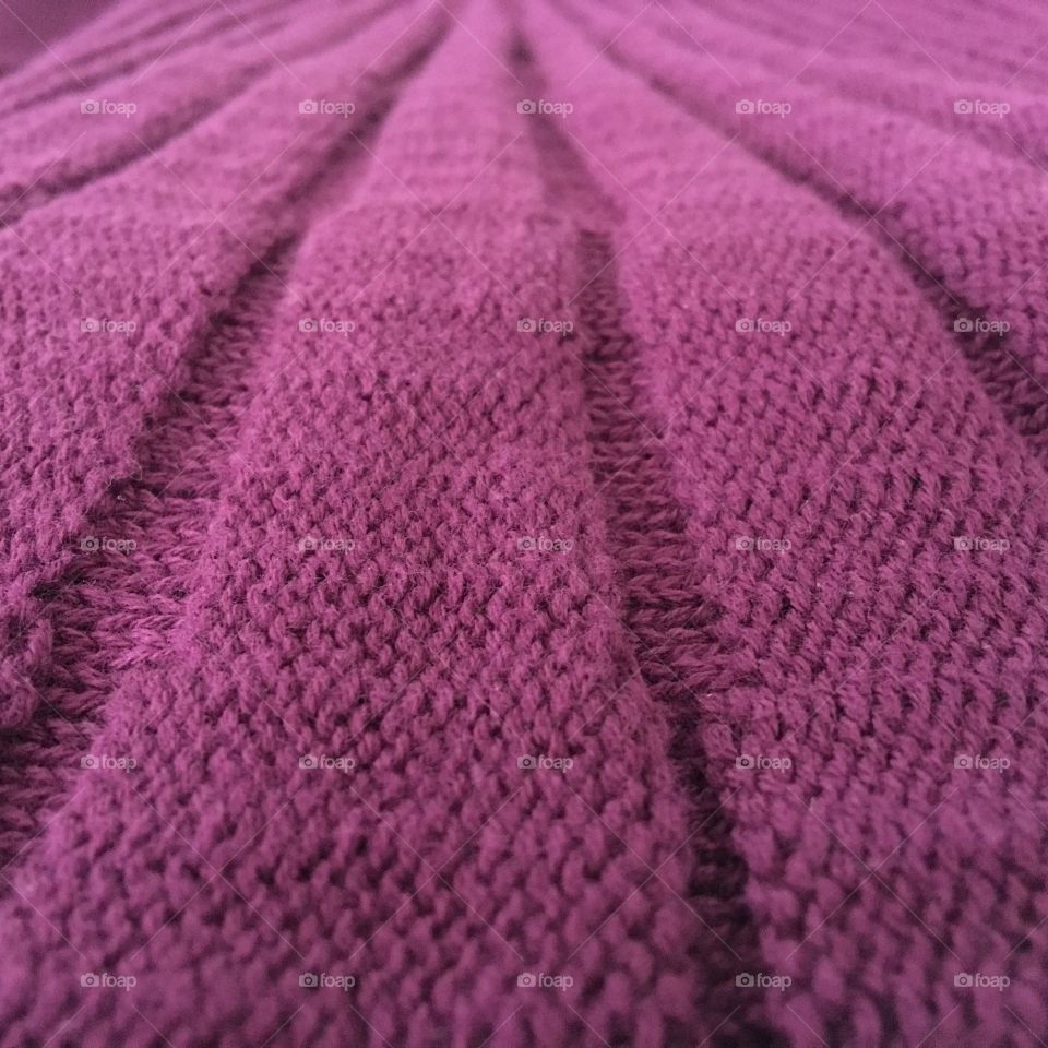 Rows of purple knit