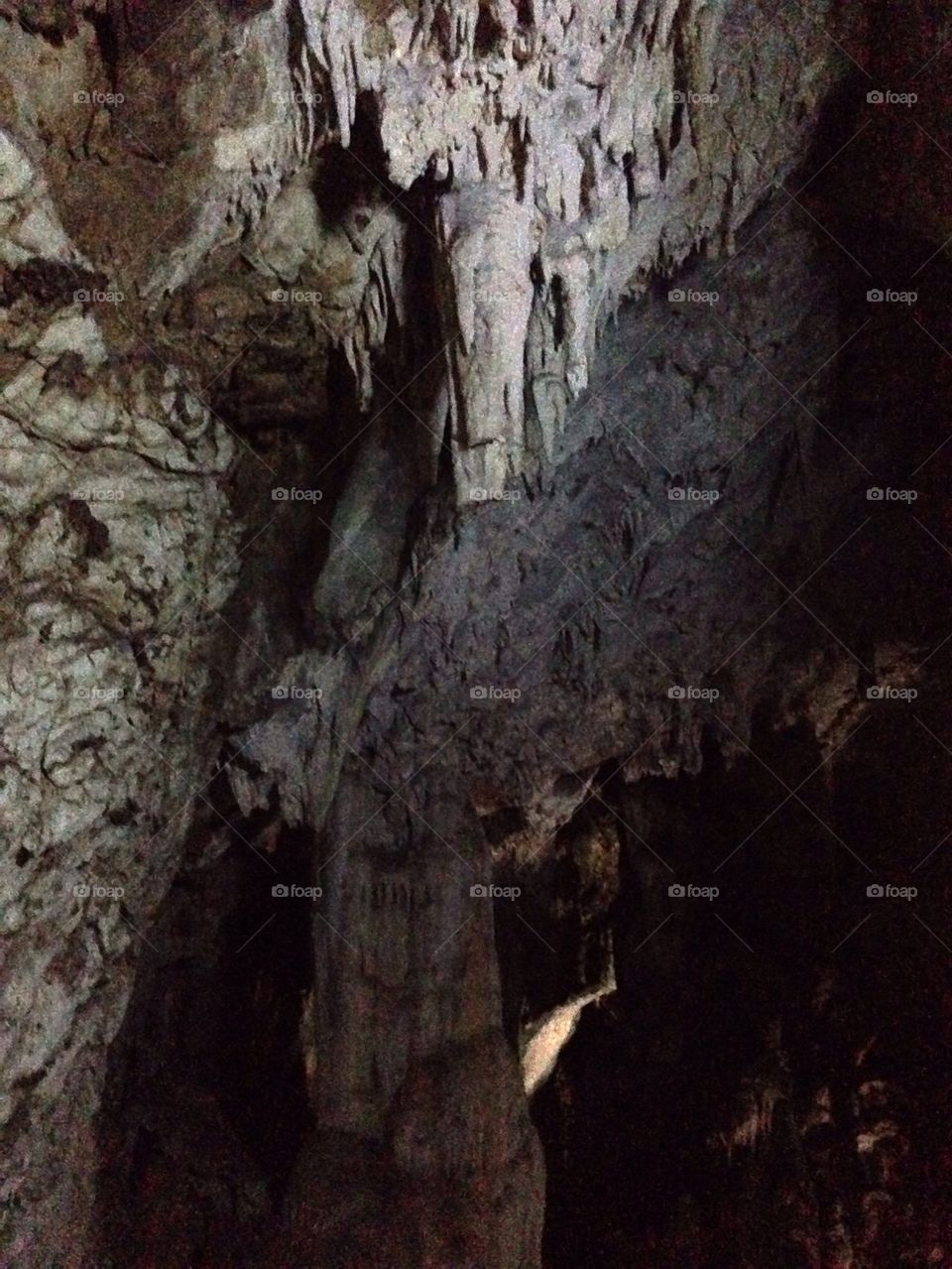 Stalactite in Dark Cave