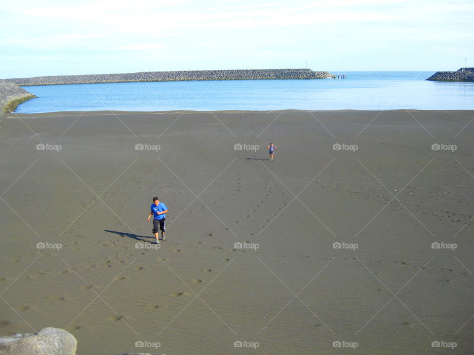 Beach to our selves, running for the sale of doing so.  Looking at our solitary foot prints in the sand.
