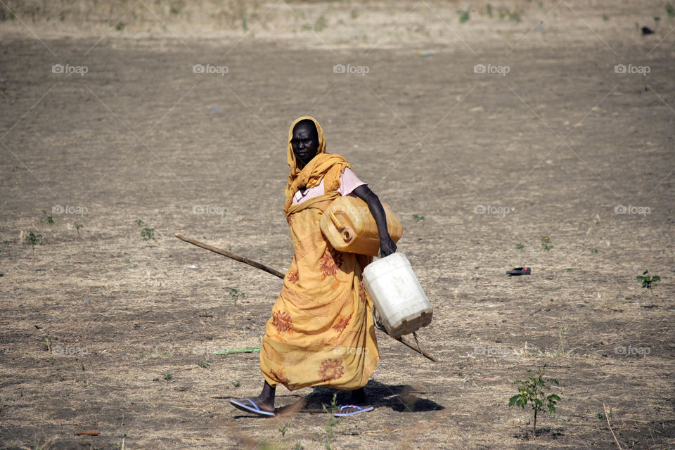 Women in Africa suffer from water scarcity and are responsible for preparing food for the home and children