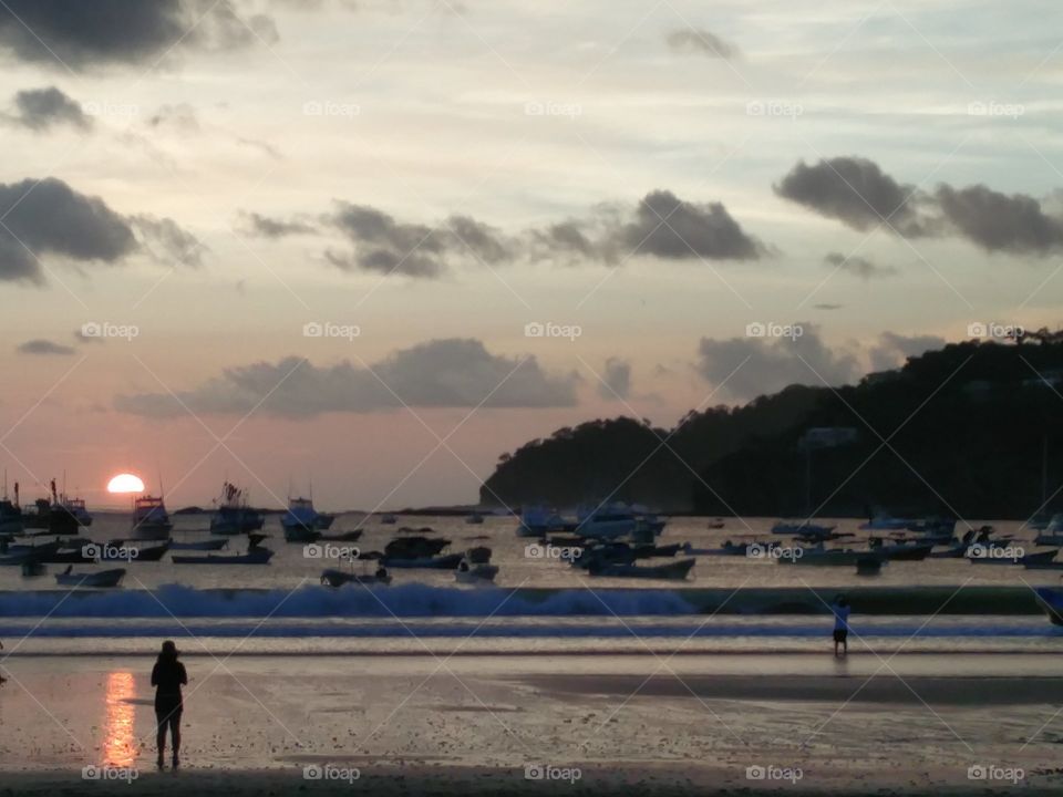 boats sunset