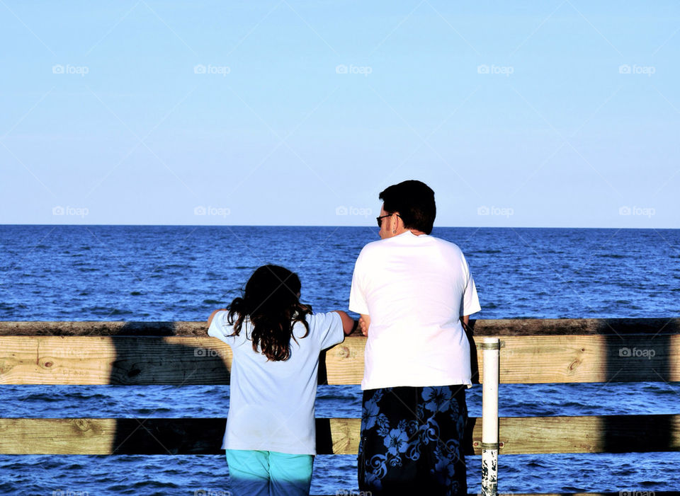 Father and daughter on beach