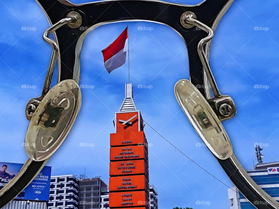 The simpang lima Monument Bandung, Indonesia, Monument to the Asian African Conference, held in April 1955, Form of 11 vertical atacked cubes 15 meters high, on each surface was the name of the 109 countries, that participated in historic conference