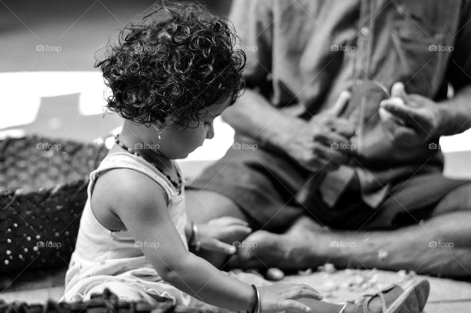 Kid helping elder.